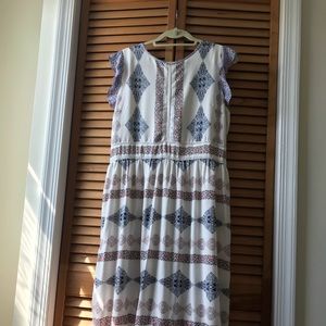 Dress with ruffle sleeve and eyelet overlay trim